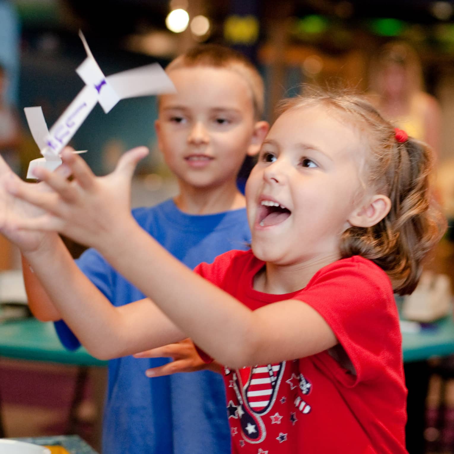 Children playing in an interactive museum exhibit
