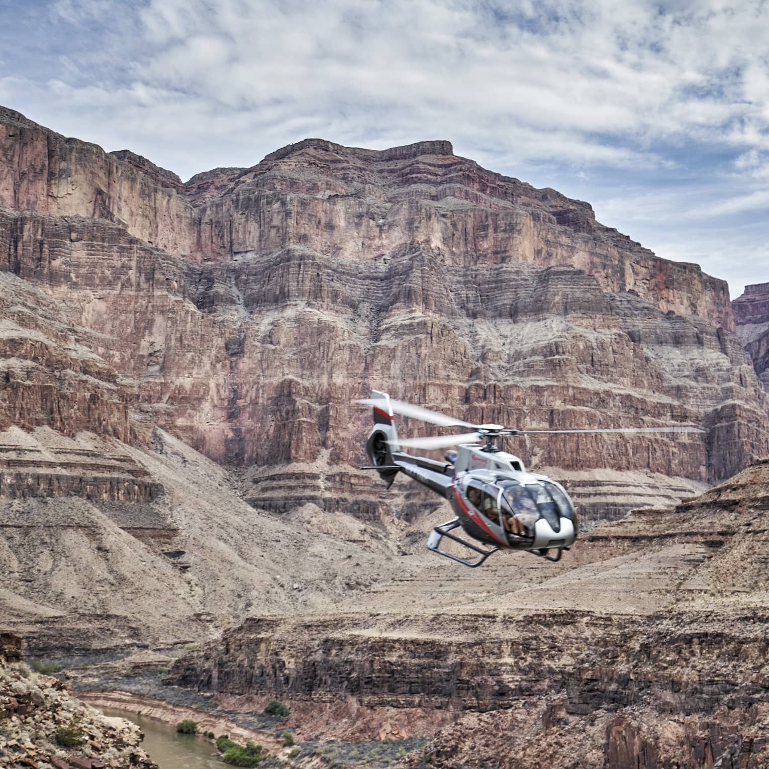 Helicopter flies over Grand Canyon