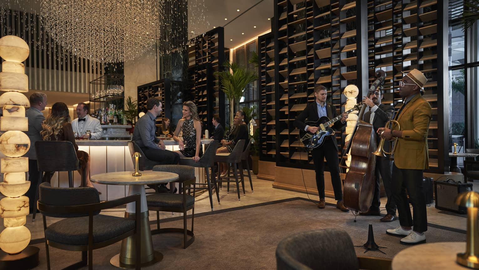 A live band and a group of people in a restaurant.