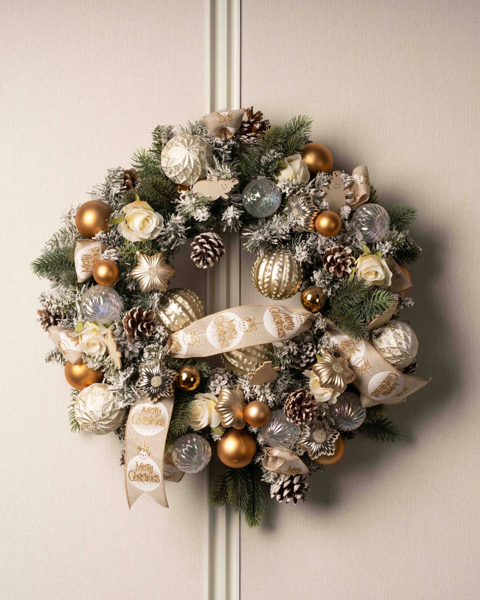 Christmas wreath with gold and white decorations