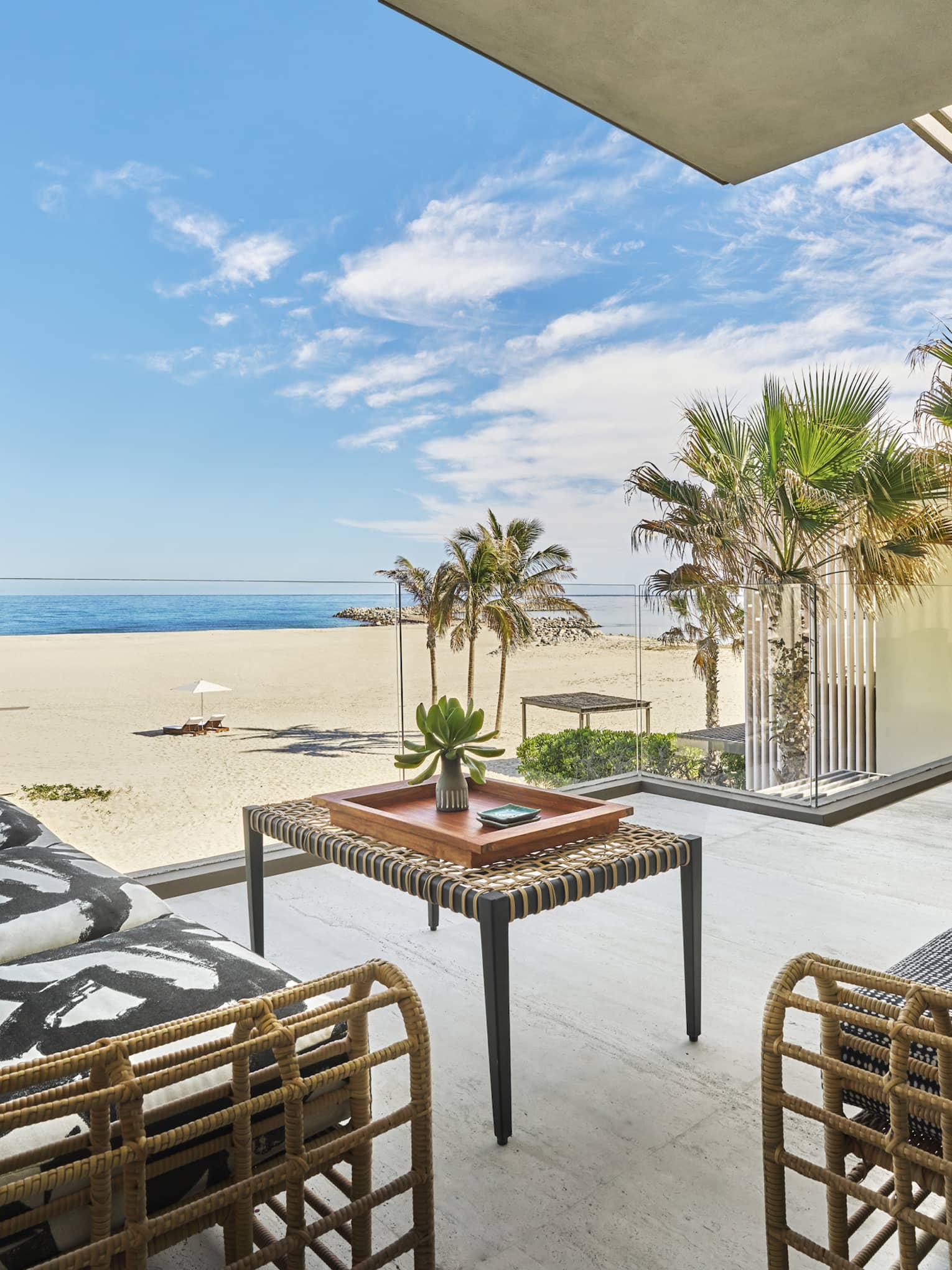 Terrace with chic lounge furniture, oceanfront suite at Four Seasons Resort Los Cabos