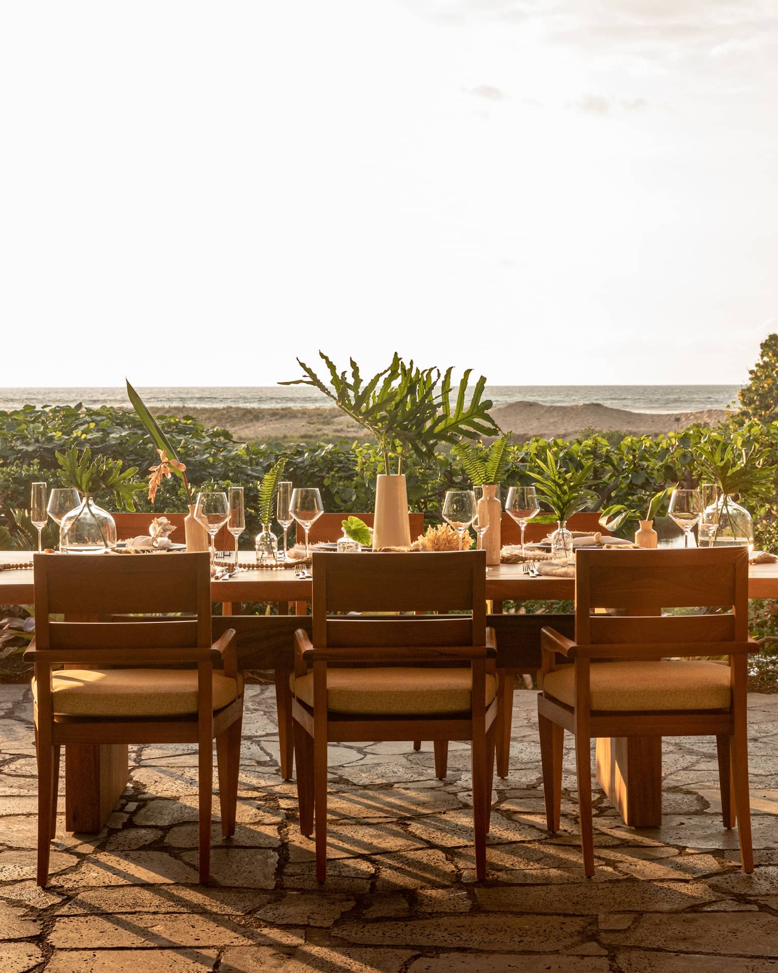 Outdoor dining table for six set near Hawaiian beach