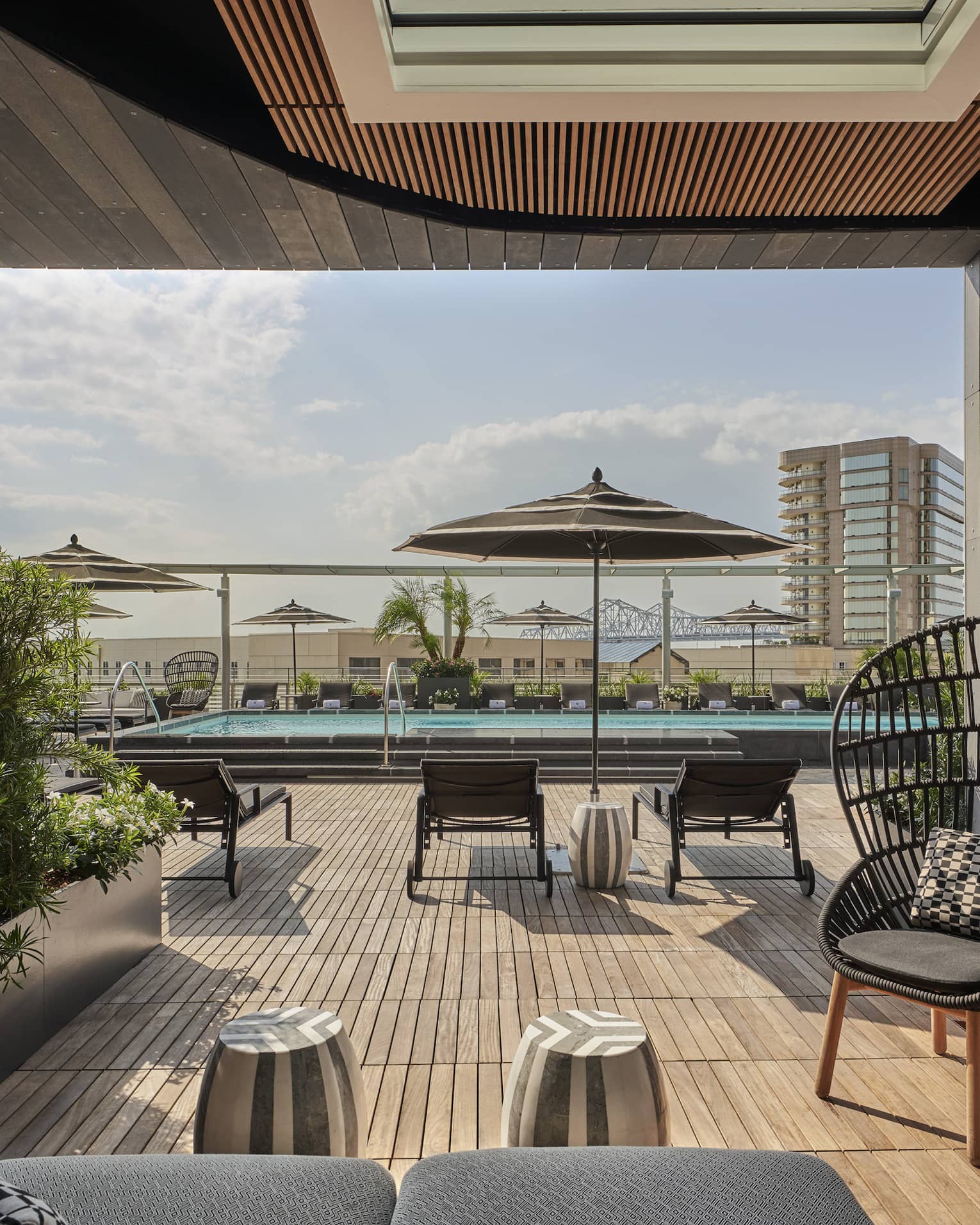 A cabana near an outdoor pool.