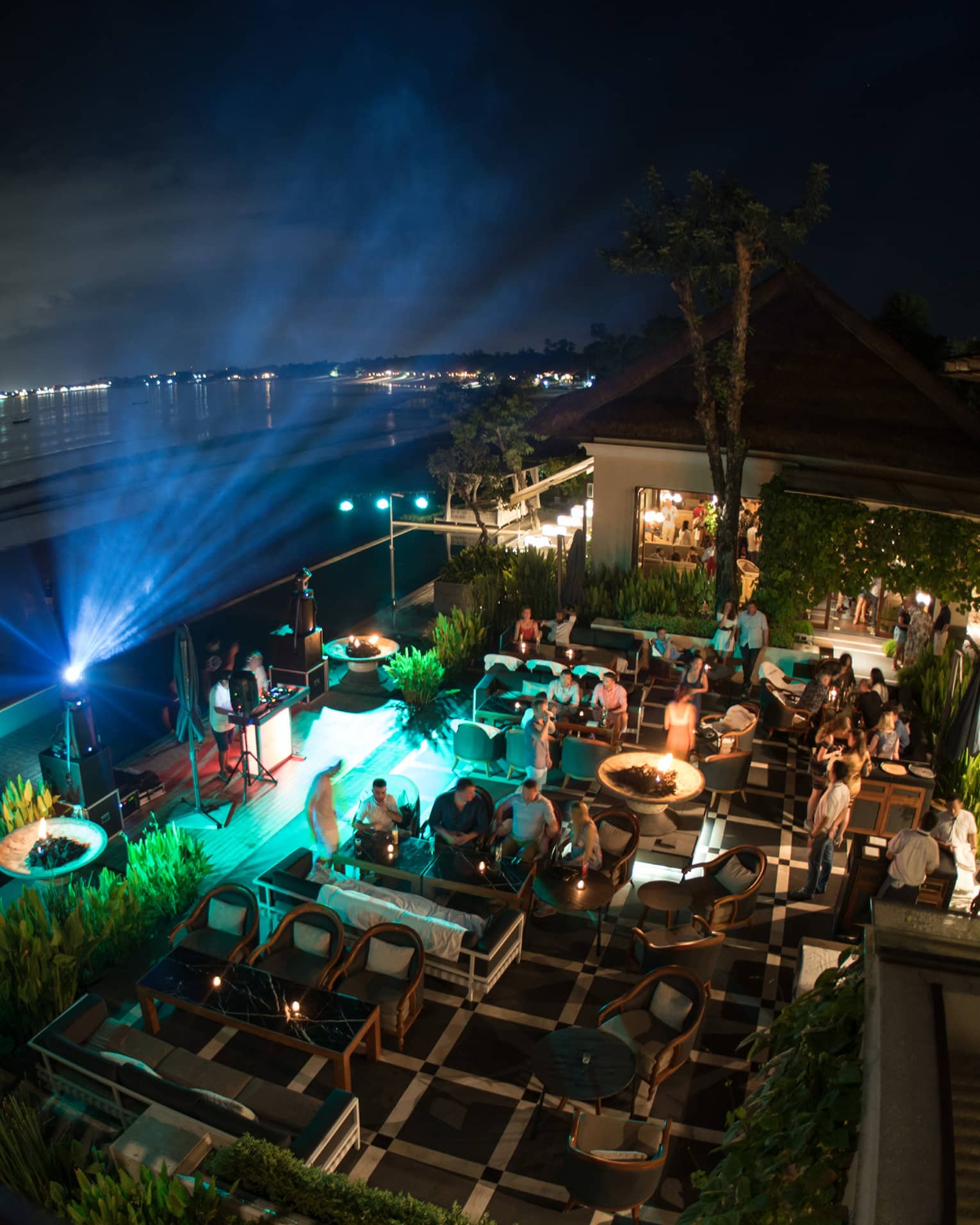 CEO Circle event happening outside at night at Four Seasons Bali