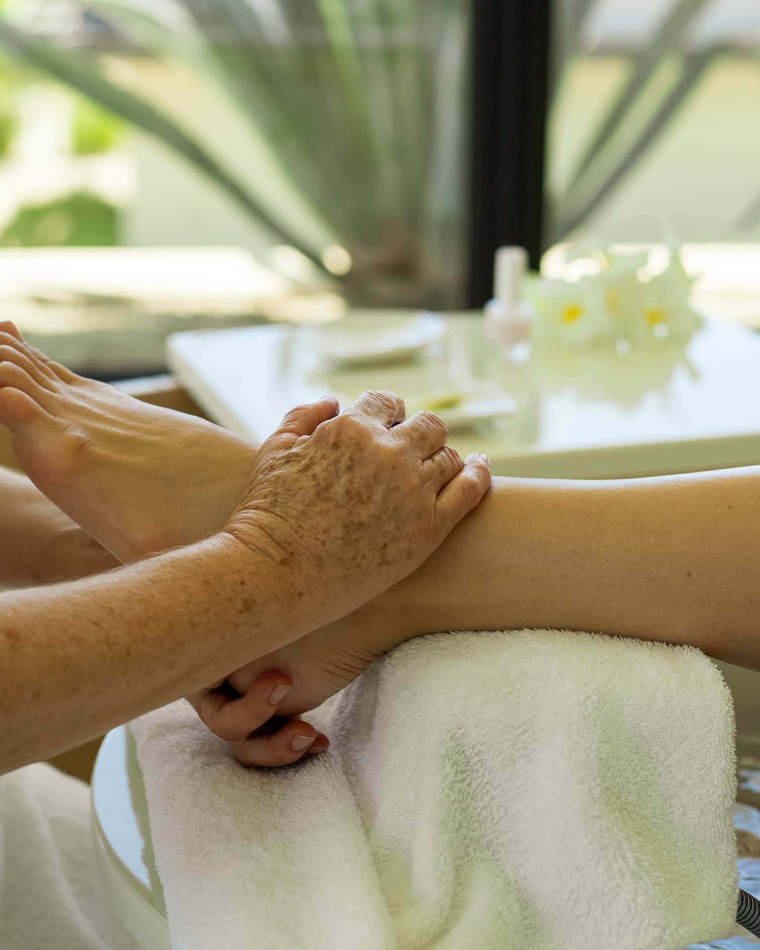 A person gets a pedicure at salon