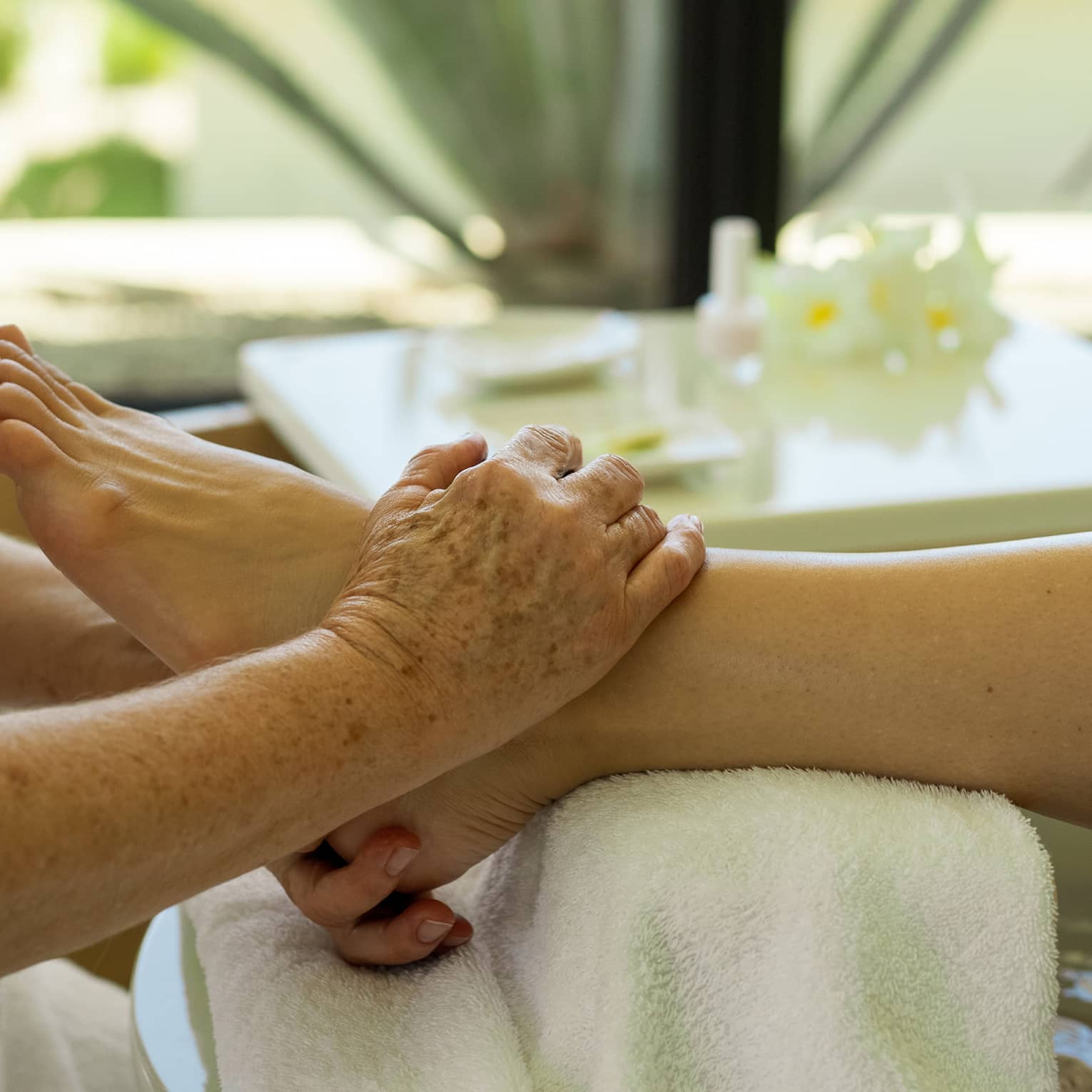 A person gets a pedicure at salon