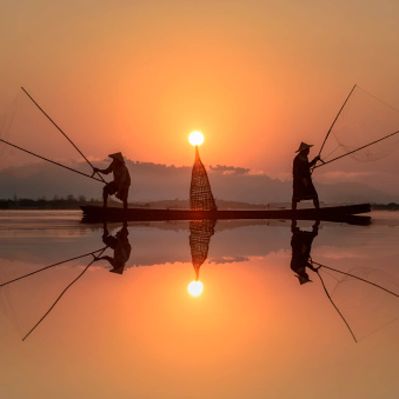 Fisherman fishing in Mekong river, Thailand 