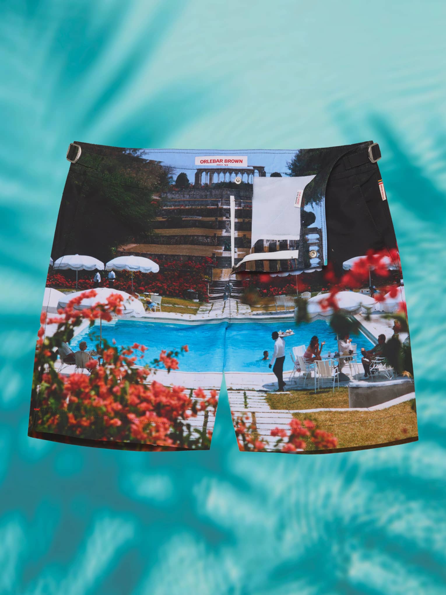 Swimsuit shorts with an image of a pool printed on it