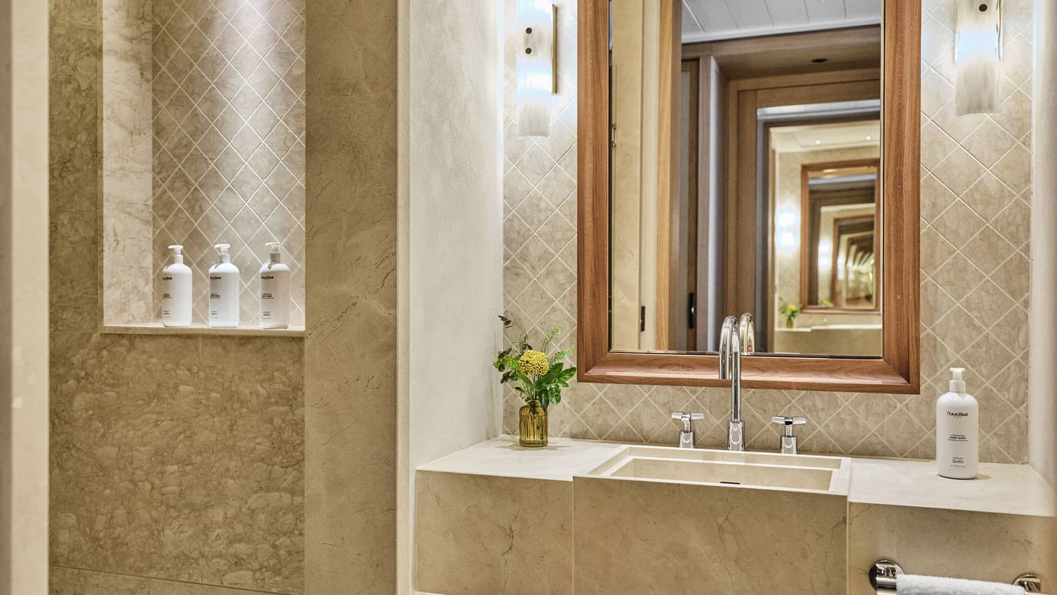 Luxury resort room bathroom with walk-in stone shower