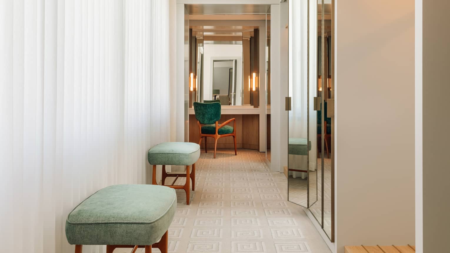 Changing area with two small turquoise benches and vanity