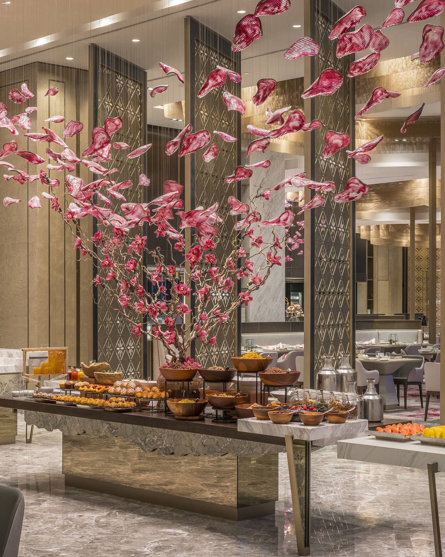 Curate buffet with floral arrangement