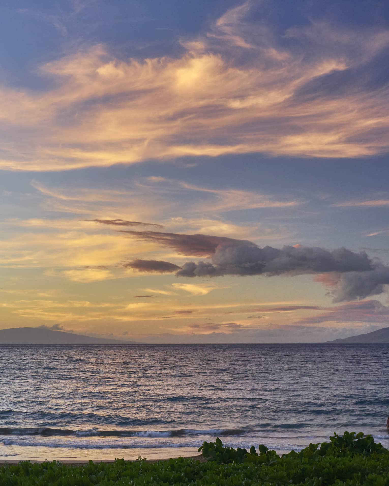 Sunset and clouds over Pacific ocean