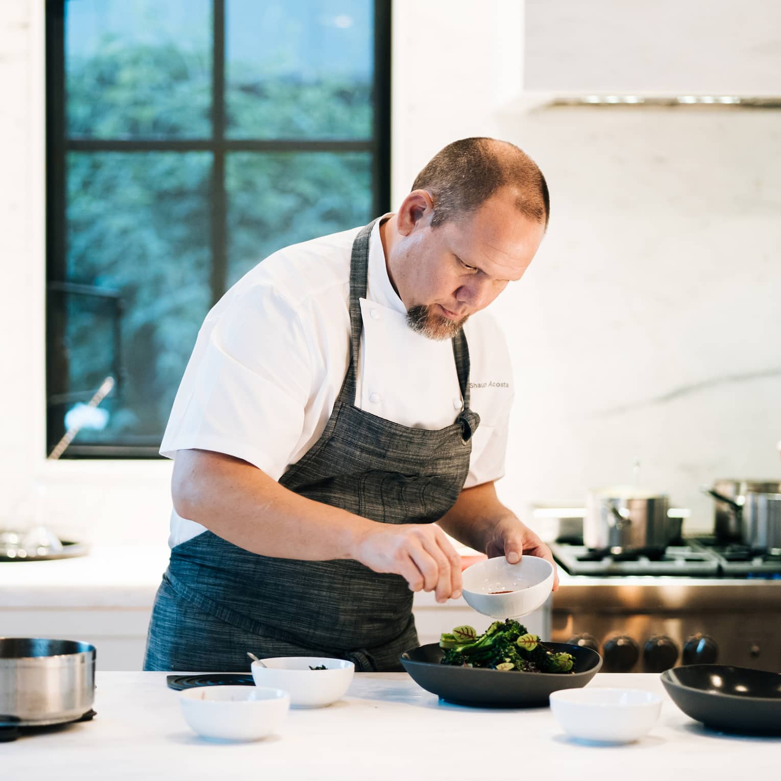 Chef in the kitchen preparing food