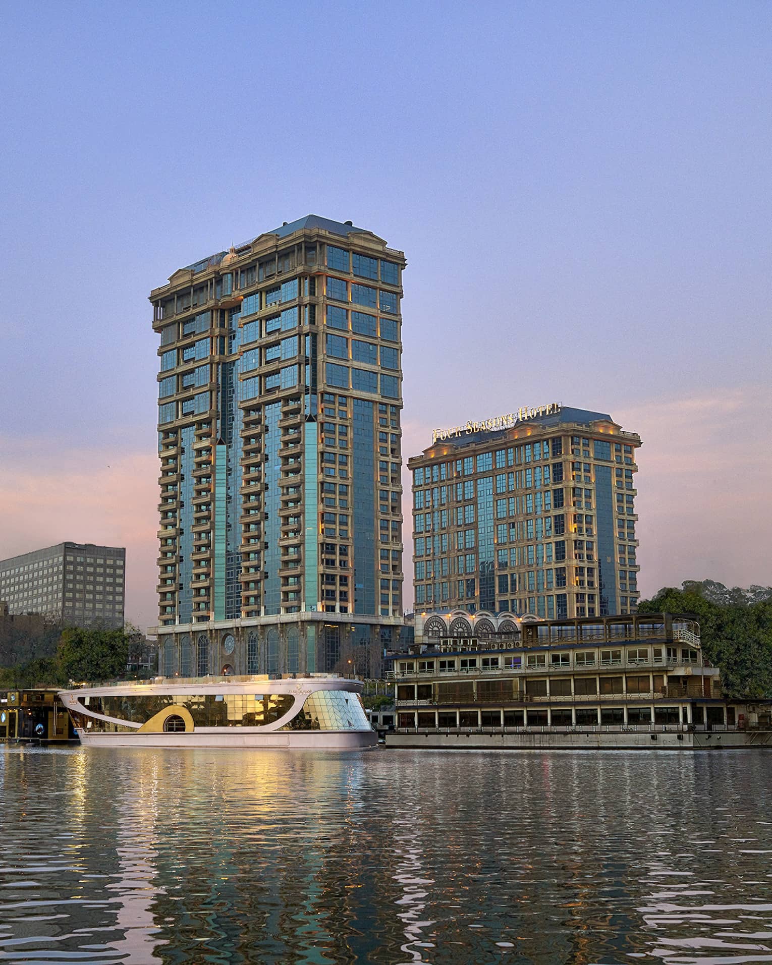 Cairo at the First Residence exterior illuminated at sunset
