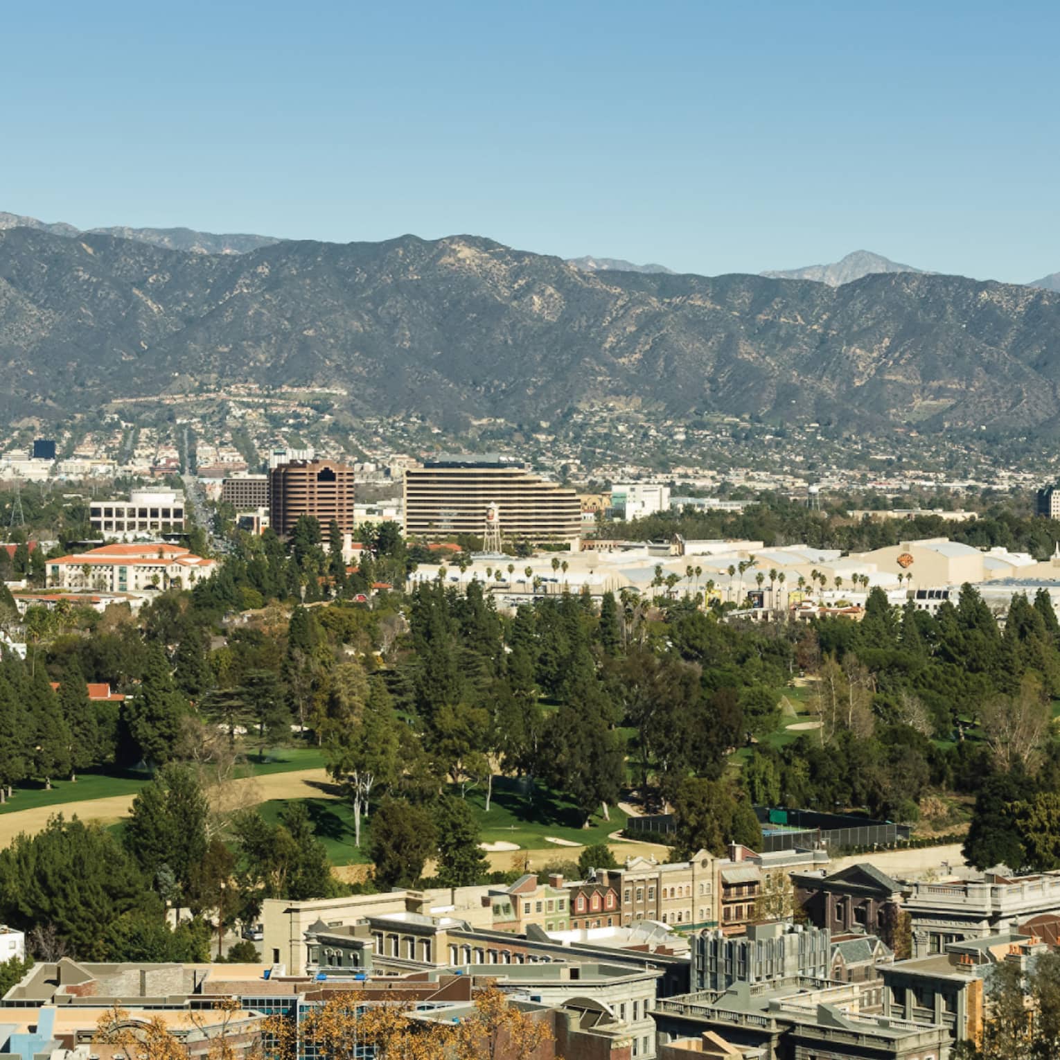 Aerial view of the city with mountains in the background