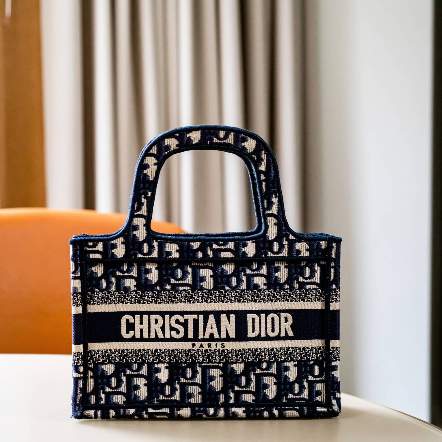 A bag with a Christian Dior label on it.