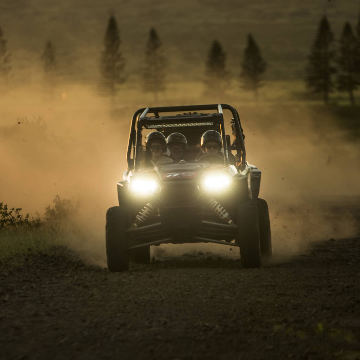 UTV rides through a rugged landscape