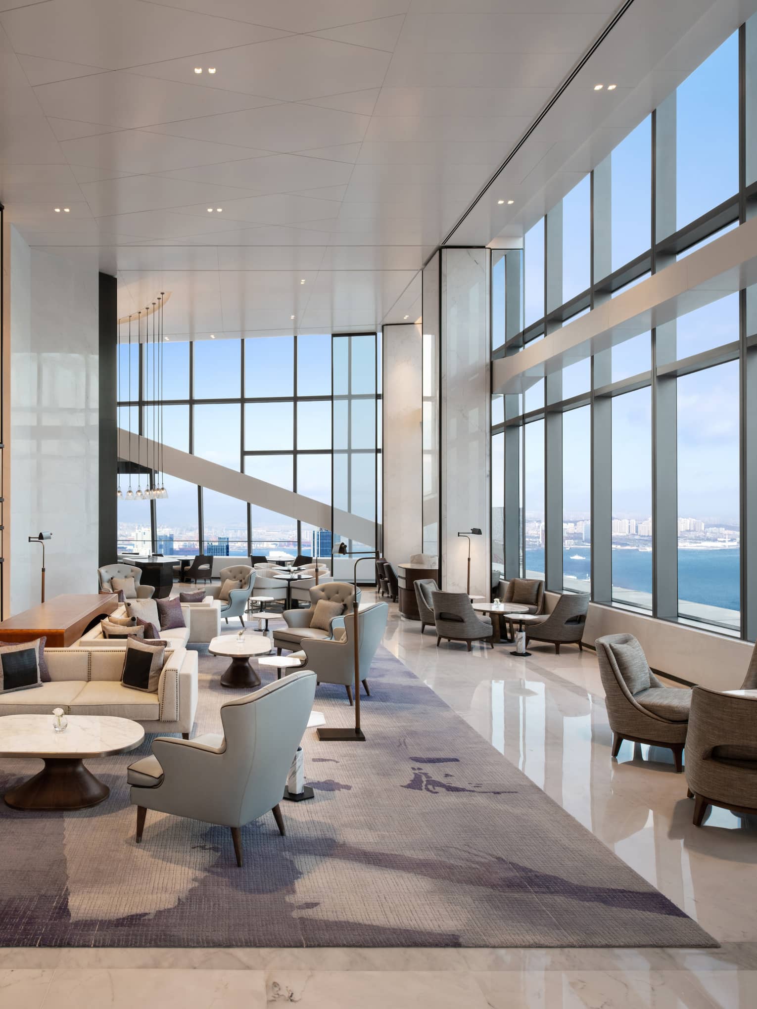 Hotel lounge with water view at Four Seasons Hotel Dalian