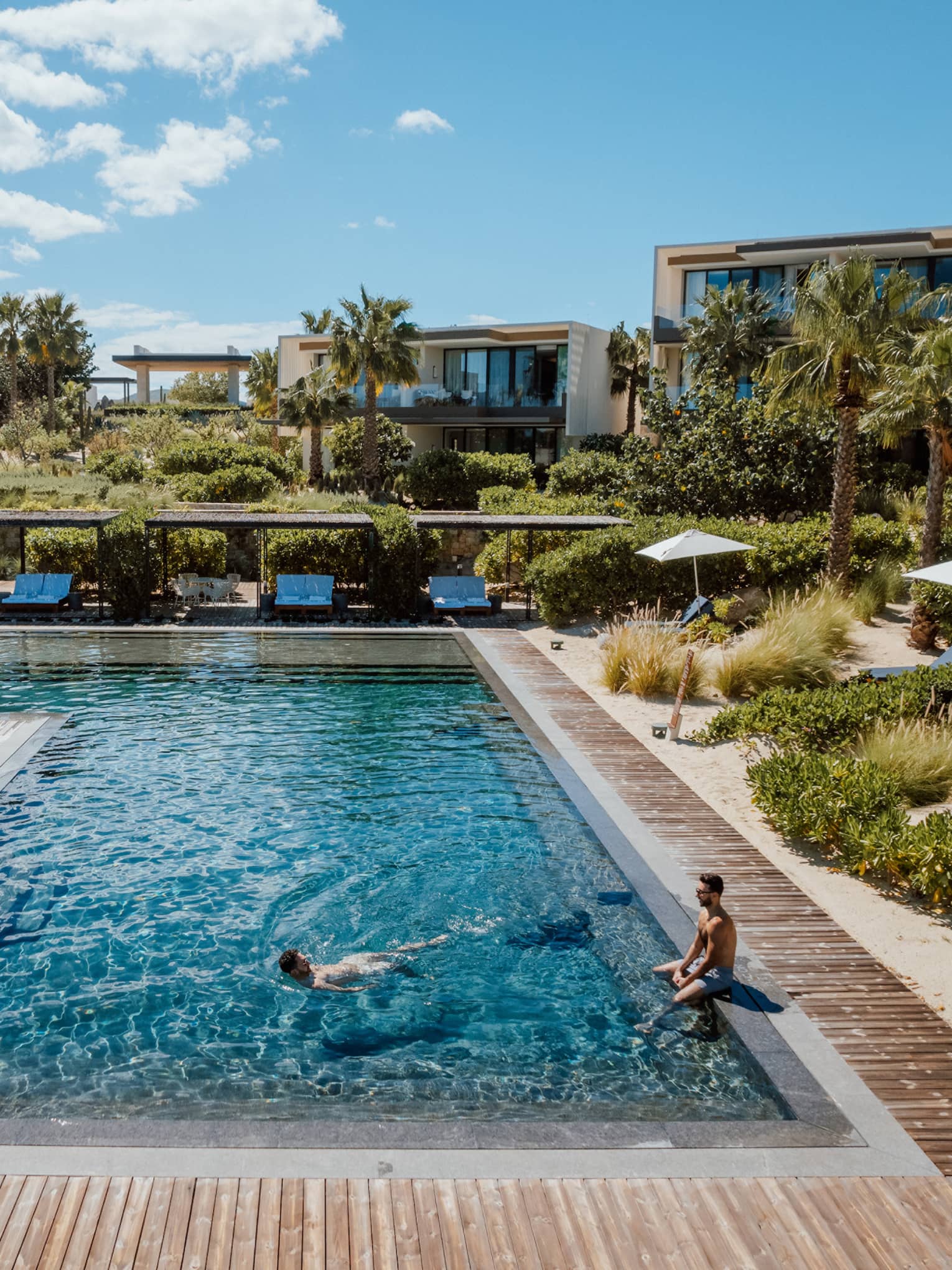 L-shaped resort pool in tropical location