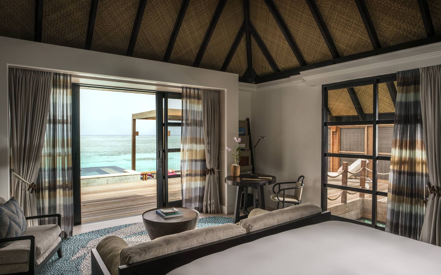 A calming sea view from inside a water suite