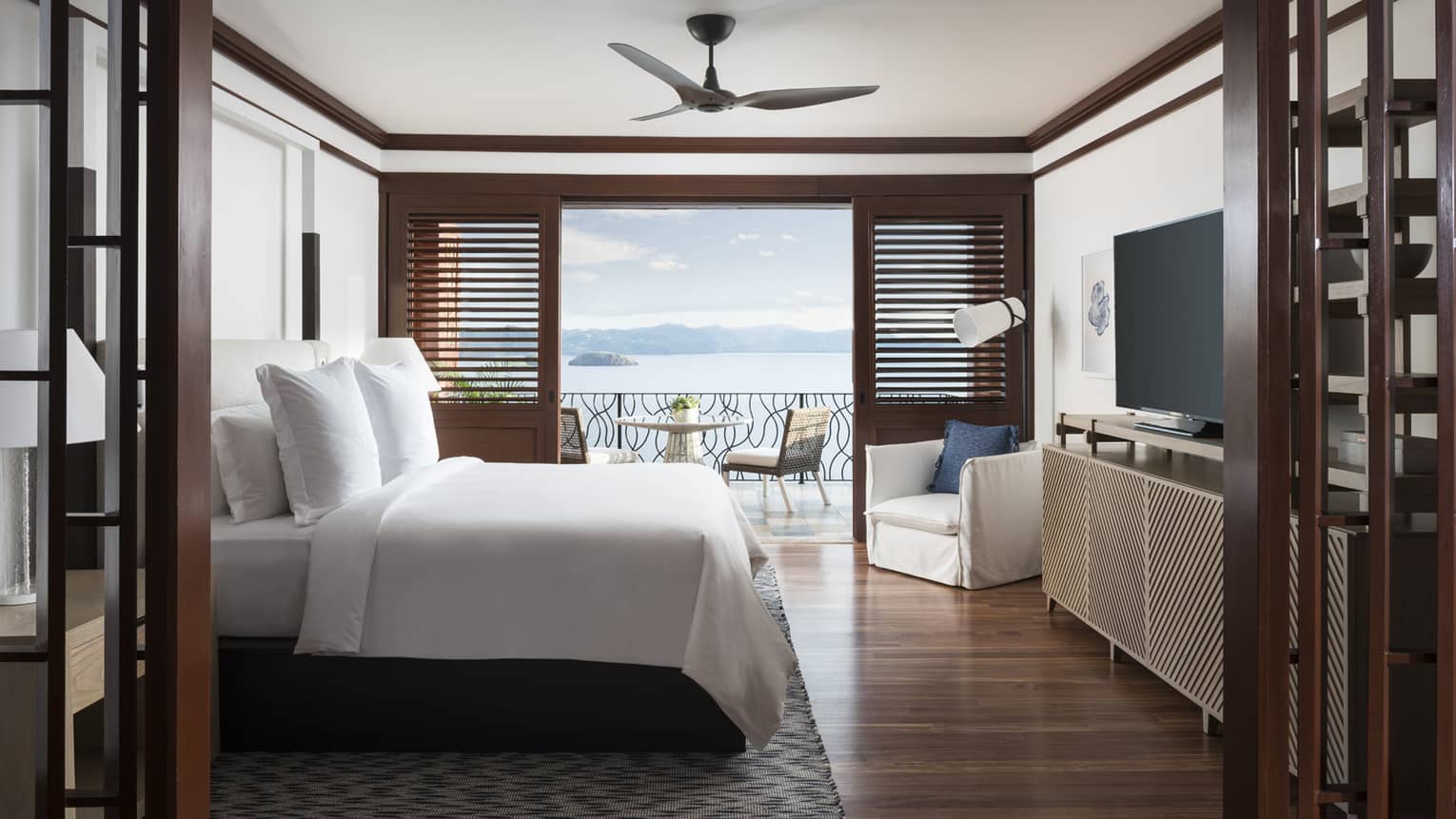 One-Bedroom Residence Villa with Plunge Pool wood framed wall to bedroom, wood shutters beside sunny patio door