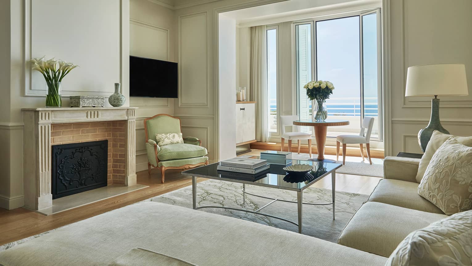 Palace Sea-View Suite, sofa, armchair under high ceilings, fireplace, window alcove with dining table
