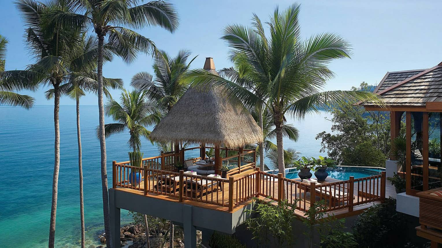 Two-Bedroom Residence Villa with Pool patio with thatched roof cabana on mountain high above trees, ocean