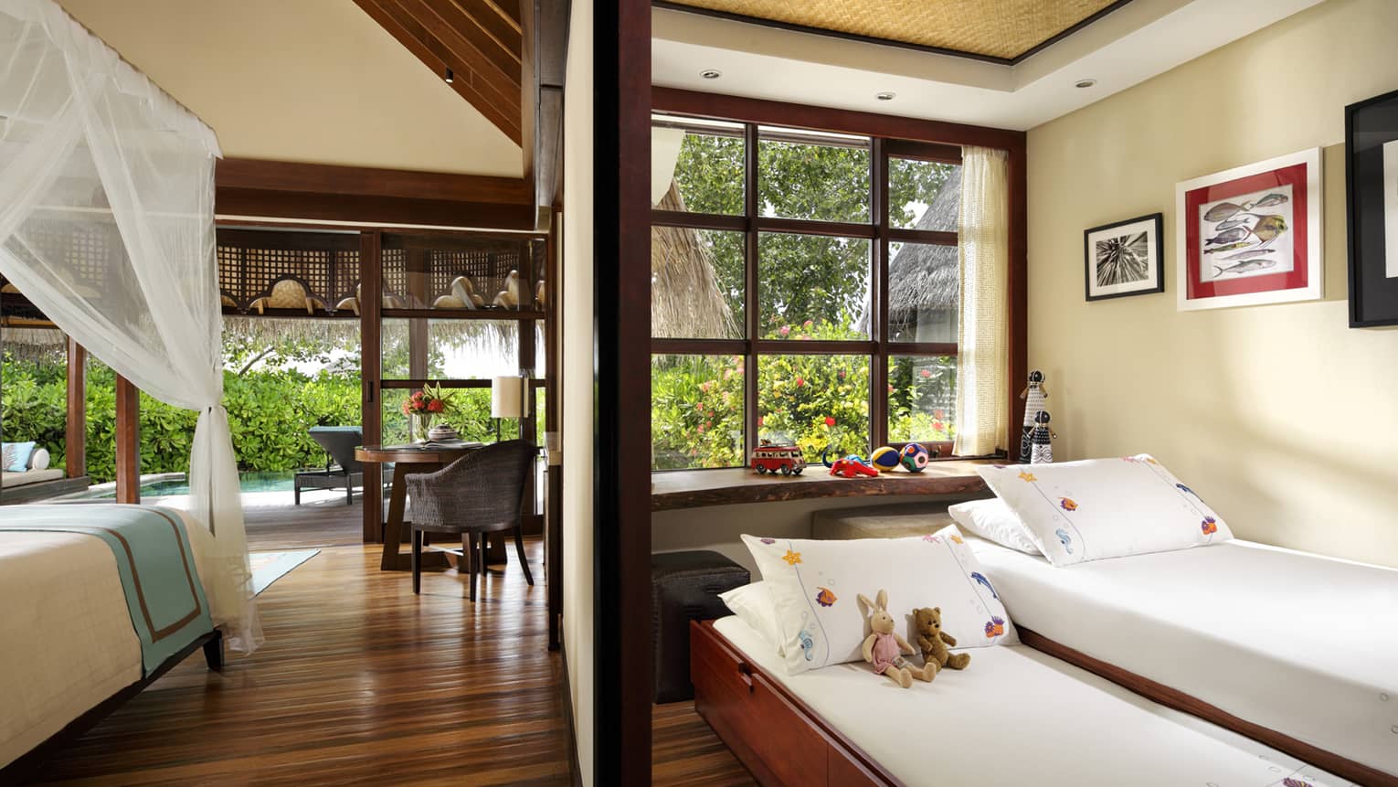 Rooms inside family beach bungalow with pool