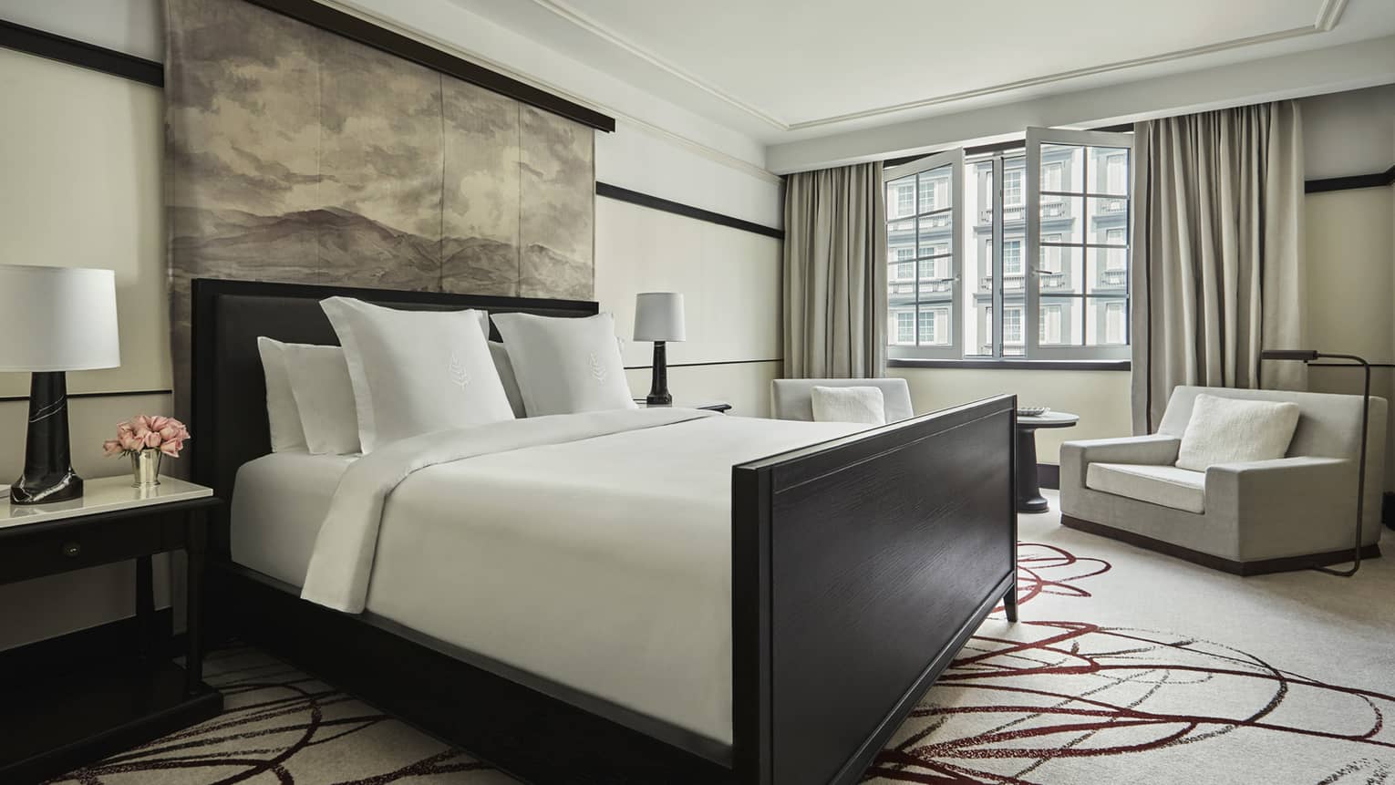 Bedroom with king bed, dark wood bed frame