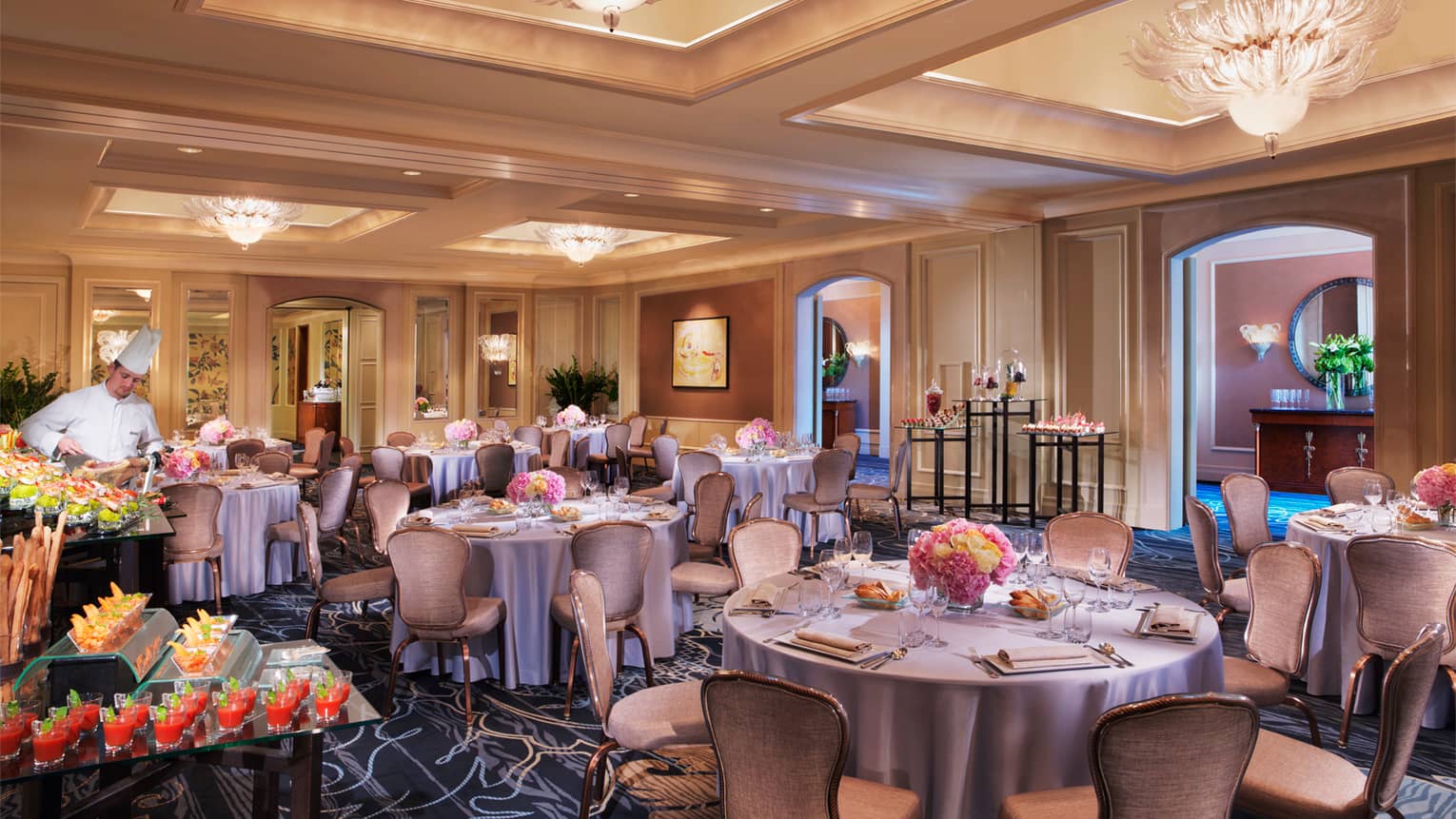 Round banquet tables, appetizer stations in Karel Ballroom