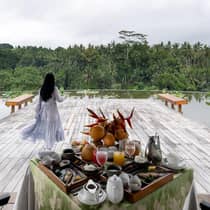 Woman on decking overlooking Ayung River Valley