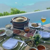 Poolside dining with an ocean view