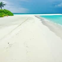 Long white sand private beach, turquoise waters of lagoon