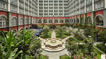 Bright tropical garden inner courtyard below Four Seasons Hotel Mexico City