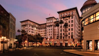 Beverly Wilshire, A Four Seasons Hotel building exterior, entrance at sunset