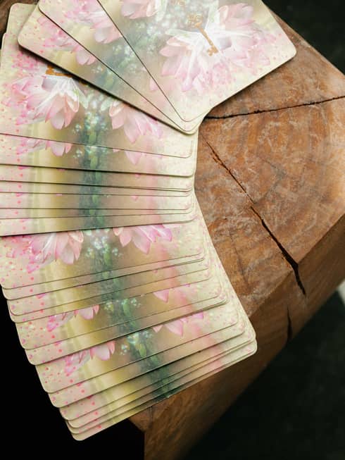 Cards for card reading, displays out on a wooden table