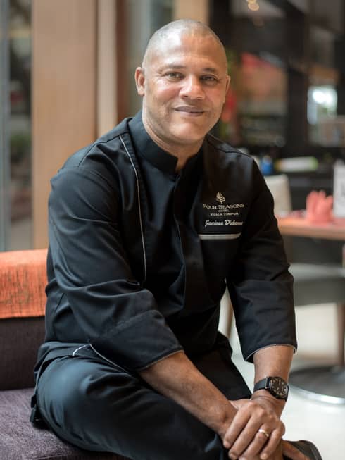 Junious Dickerson, a food and beverage staff member