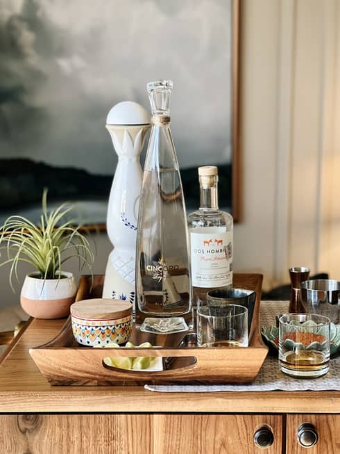A tray with alcohol to make drinks.