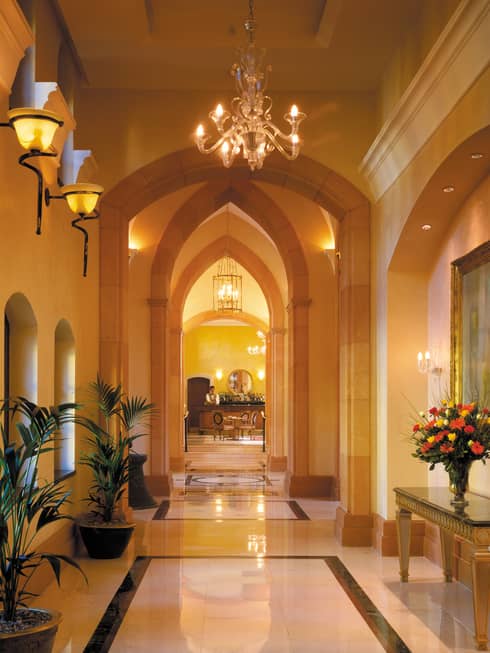 Pinched arches in elegant, dimly-lit hotel lobby