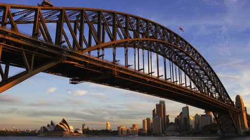 Sydney Harbour Opera House and Harbour Bridge at sunset Sydney, Australia