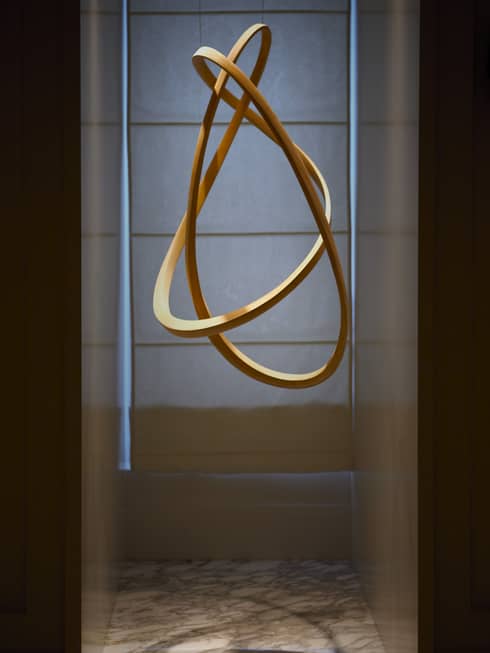 Suspended curved ash wood sculpture 