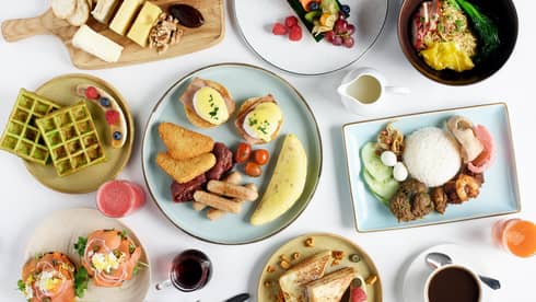 Breakfast spread at Curate including French toast, eggs royale, Nasi Lemak and other traditional dishes