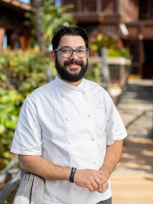 Portrait photo of Chef Kalani Garcia in unform