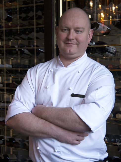 Portrait photo of Executive Pastry Chef Denis Rusachkov