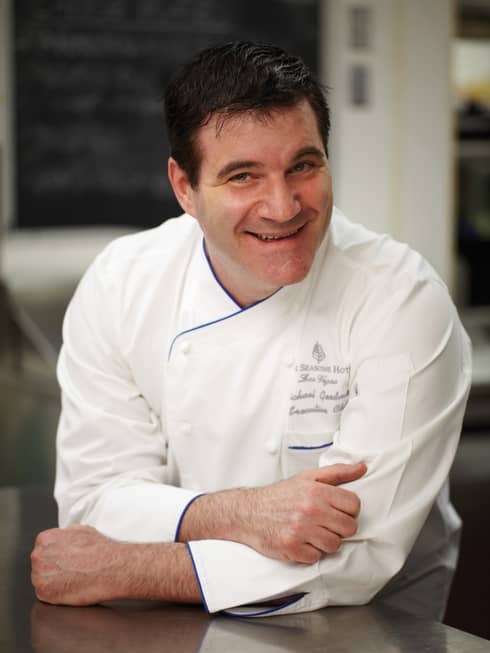 Portrait photo of Executive Chef Michael Goodman wearing uniform