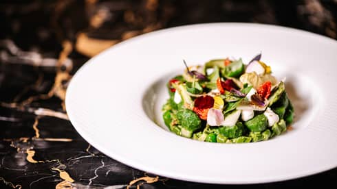Bowl of Sweet Potato Gnocchi with Borage, Spring Vegetables and Ricotta
