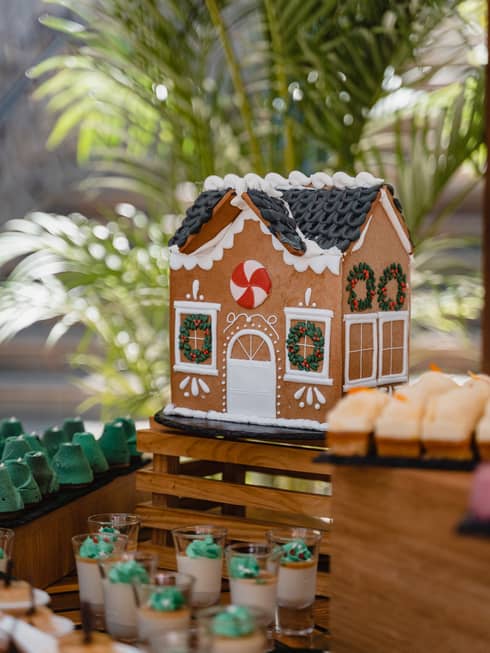 Holiday Gingerbread House set on a dining table