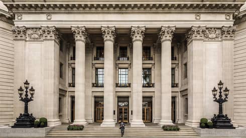 Ten Trinity Square front entrance with tall white stone pillars over steps