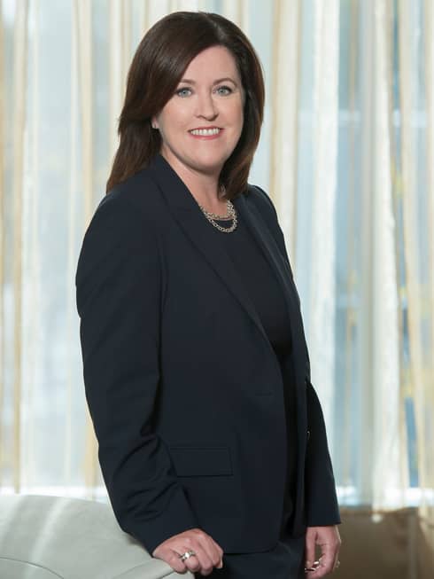 Portrait photo of Executive Vice President, General Counsel and Secretary Sarah Cohen wearing suit jacket