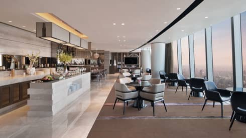 Executive Club Lounge with floor-to-ceiling windows and marble countertops
